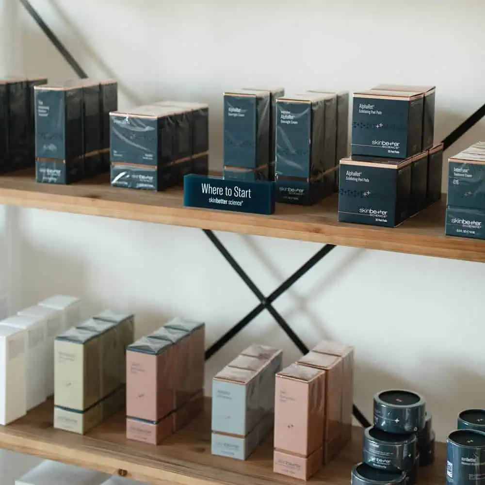 a shelf with boxes and cans on it