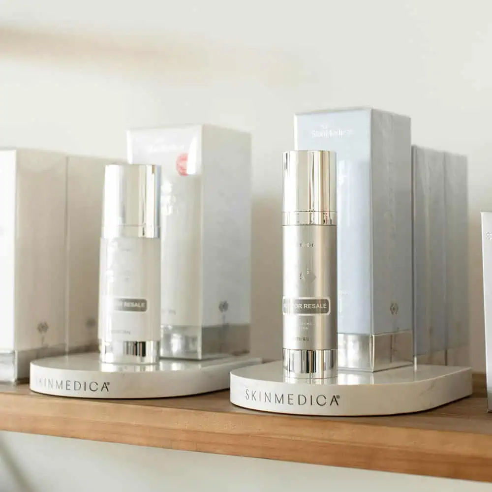 a group of white containers on a shelf